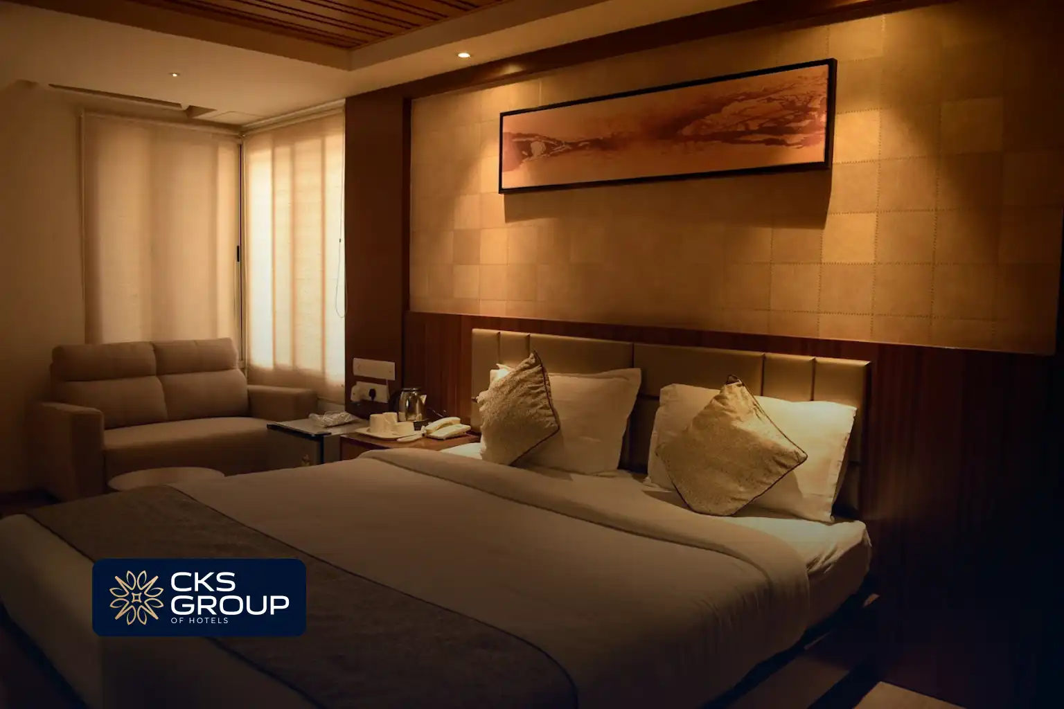 cozy hotel room with double bed and soft lighting CKS Group of Companies